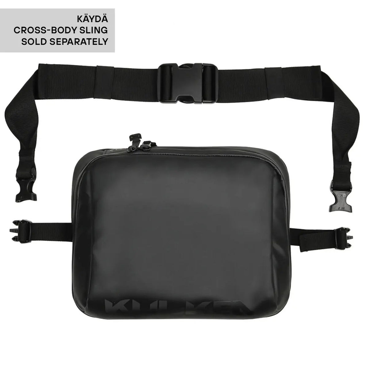 A black cross-body sling bag with an adjustable webbing strap and plastic buckle, shown on a white background with a text label in the top-left corner stating 'KÄYDÄ CROSS-BODY SLING SOLD SEPARATELY'.