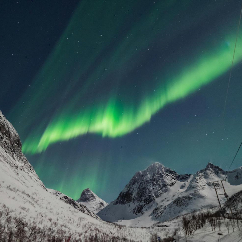 Ski mountain under northern lights