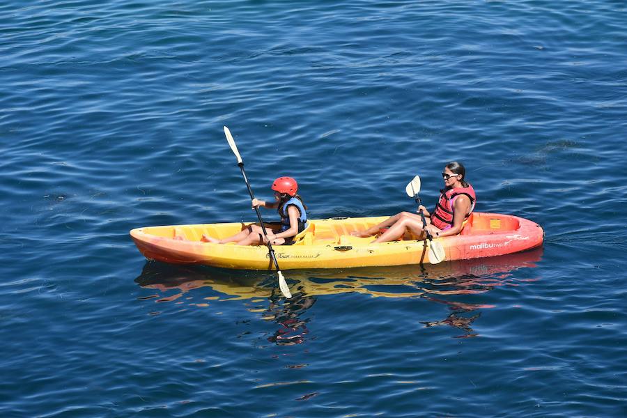Mother and daughter kayaking in a lake