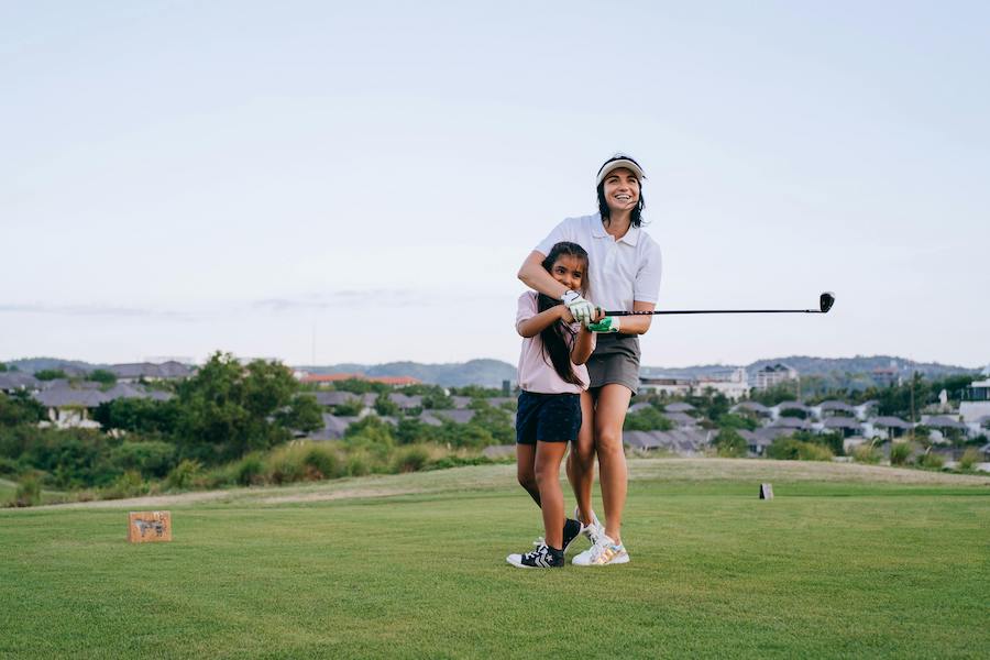 Mother and daughter on the golf course